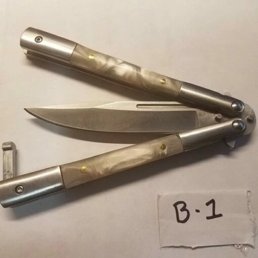 Blade Tricks Balisong 9" Pearl White Satin Folding Butterfly Knife 7 Blade Tricks Balisong 9" Pearl White Satin Folding Butterfly Knife -DIRECT KNIFE SALES Blade Tech Balisong 9 inch Pearl White Satin Folding Butterfly Knife.600